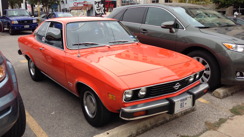Illustration for article titled This Opel Manta Is A Bolt Of Orange Lightning